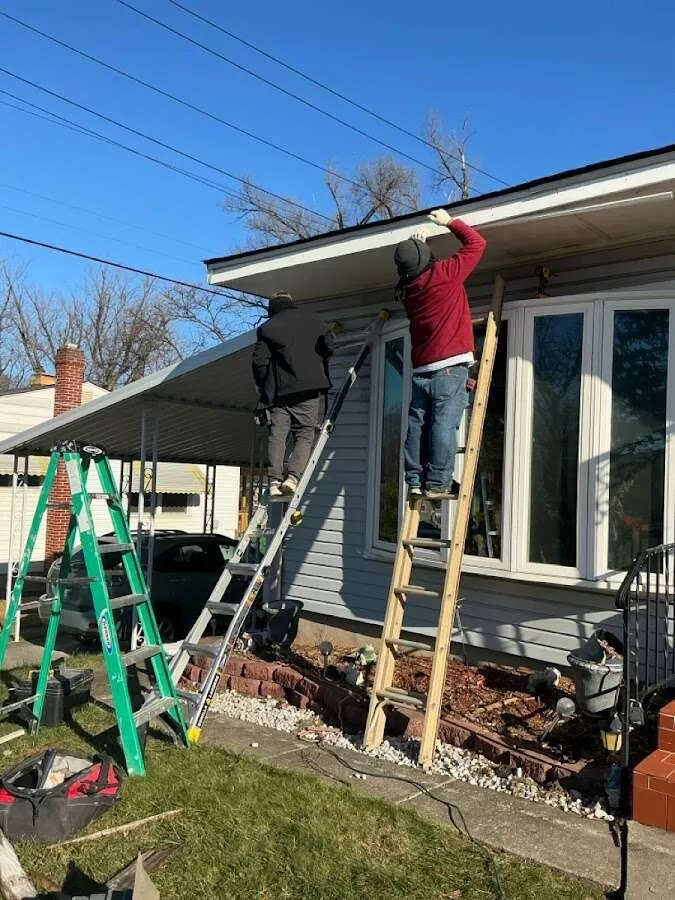 Restoration crew performing exterior repair in Gulf Breeze